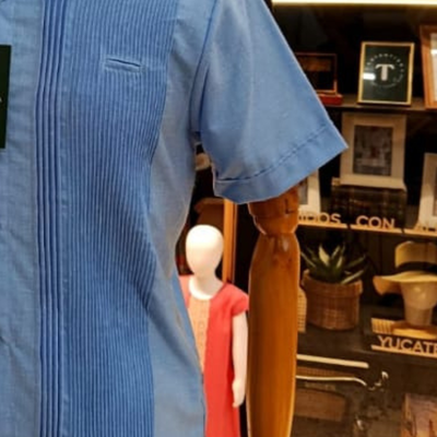 man wearing presidential blue guayabera